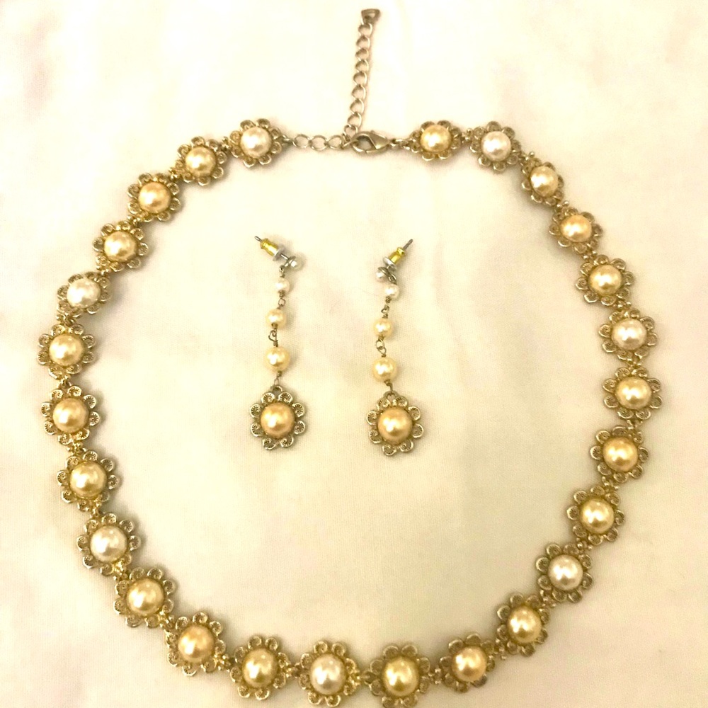 Costume Jewelry pearl necklace and earring set from a Jewelry “Party”.